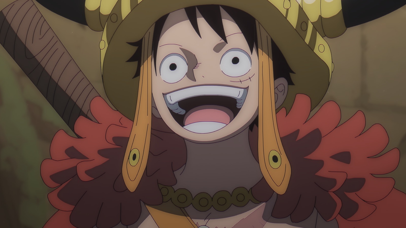 Luffy wearing a horned Elbaph helmet in the One Piece anime